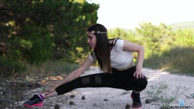 Flexi teen shows off in outdoor XXX kink on femdomerotic.com