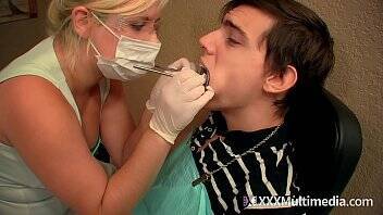 Dental Hygenist Wearing Latex Gloves and Mask Makes Patiend Cum From Handjob on femdomerotic.com