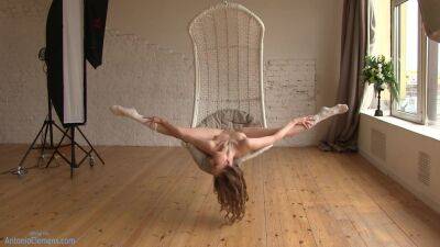 Flexible Beauty Ballerina Playfully Poses For Me In A Hanging Chair, Moving Her Long Legs Wide. 4 Of 6 on femdomerotic.com