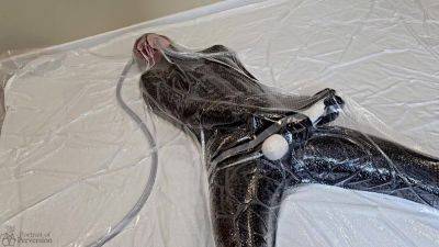 Dollified #2 - A Vacuum-sealed Latex Doll Getting Herself Off With A Magic Wand on femdomerotic.com